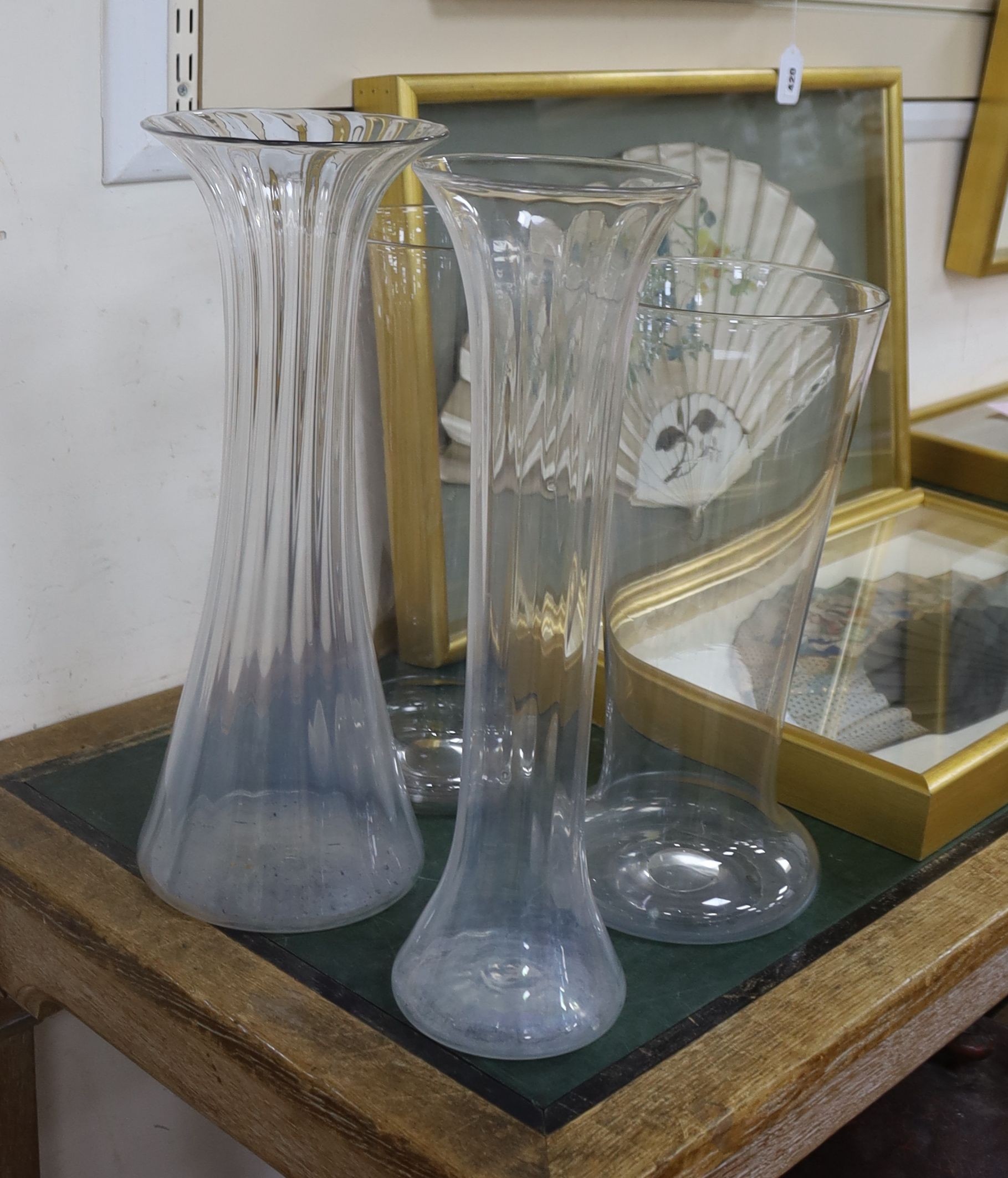 A pair of large glass vases and two similar fluted vases, late 19th century, early 20th 45.5cm